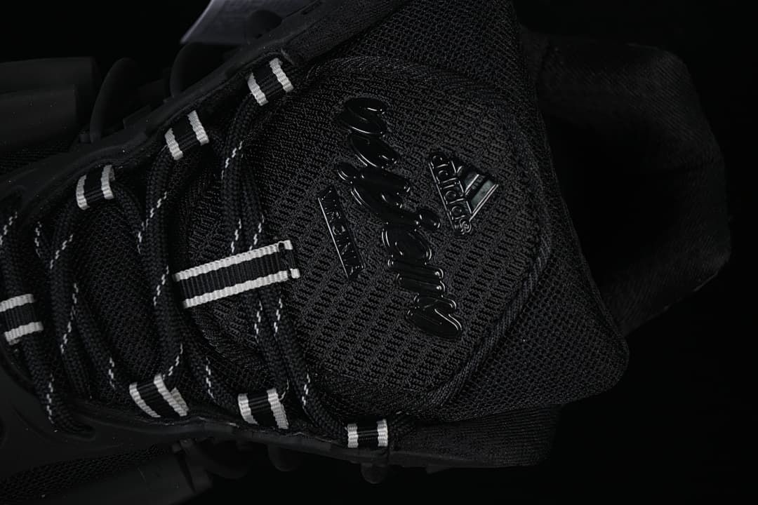 Close-up of the tongue branding and black-and-white laces.
