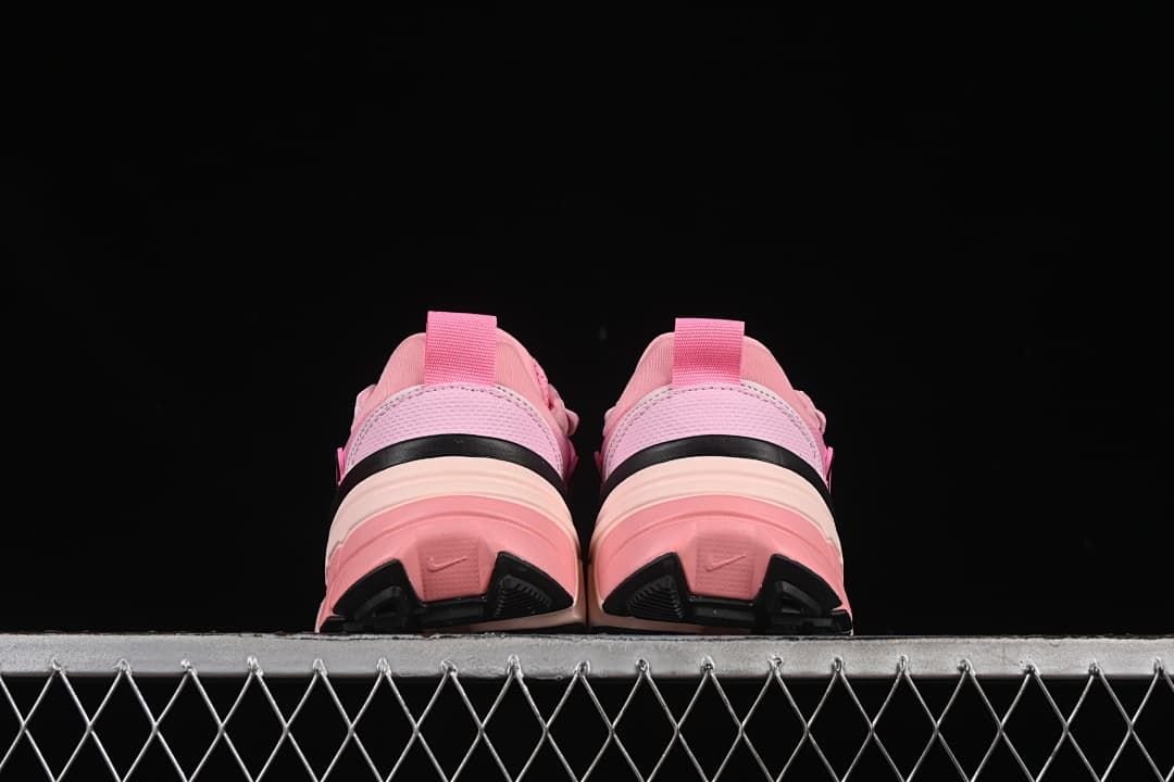 Rear view of the pair showing heel tabs and layered soles