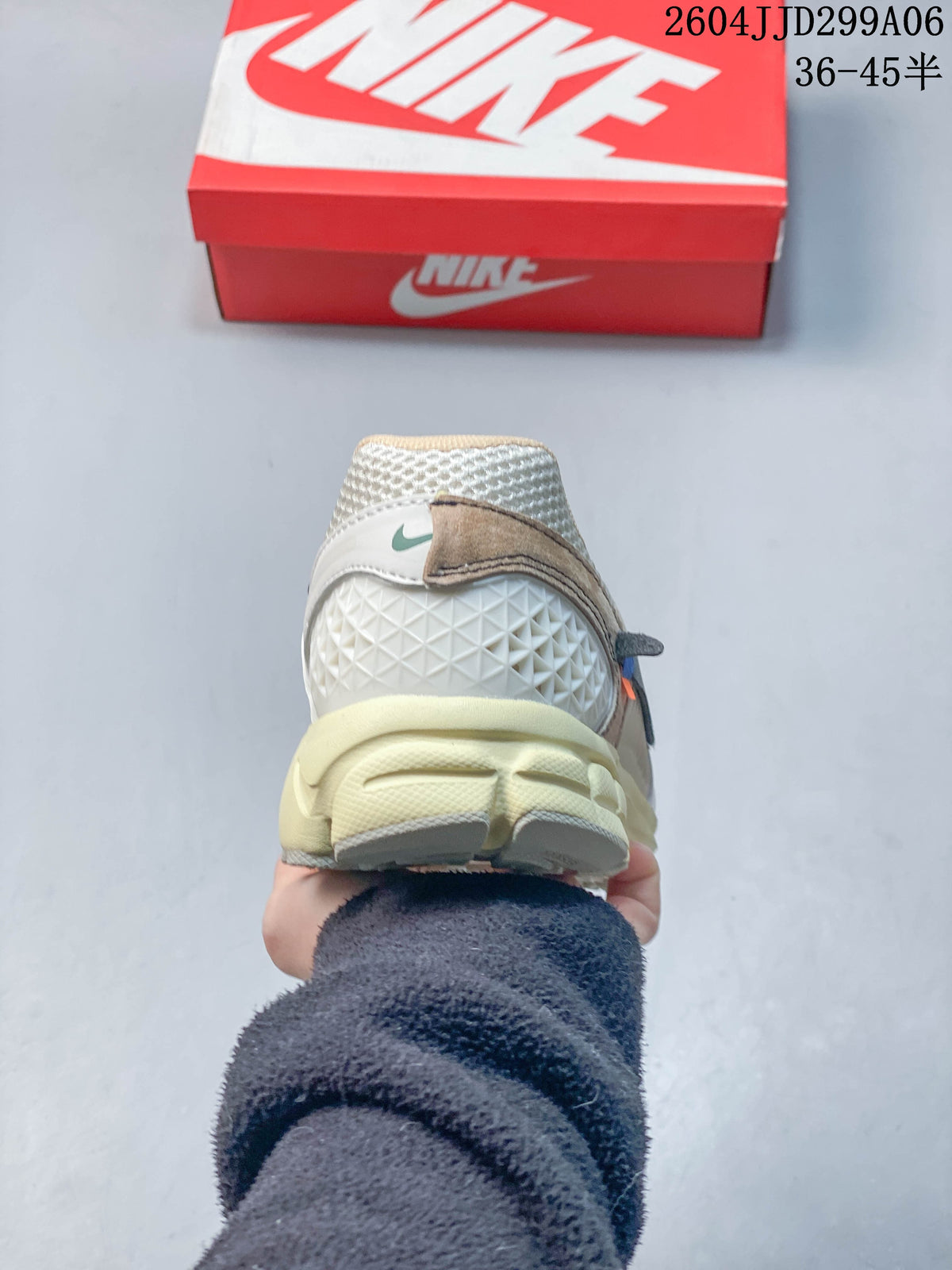 Rear view of a Nike Zoom Vomero 5 sneaker showing the heel and sculpted sole.