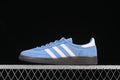 Side view of blue and white adidas Handball Spezial sneakers with a dark sole