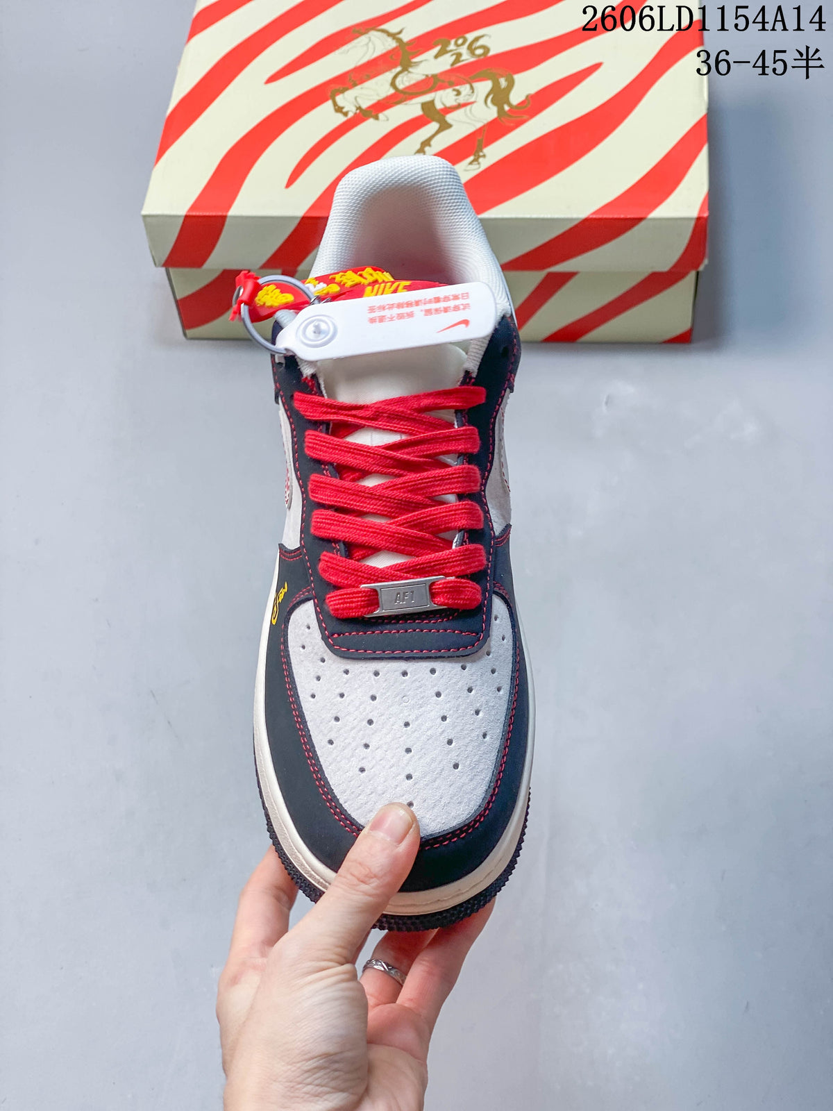 Top view showing perforated toe, red laces and navy overlays