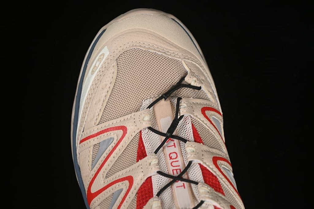 Top-down close-up of the toe, mesh panels, and lace system