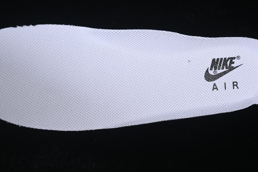 Close-up of a white insole with Nike Air branding