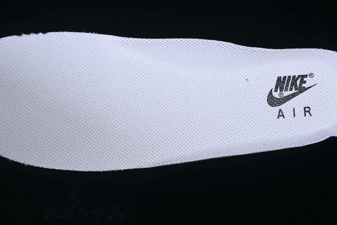 Close-up of a white insole with Nike Air branding