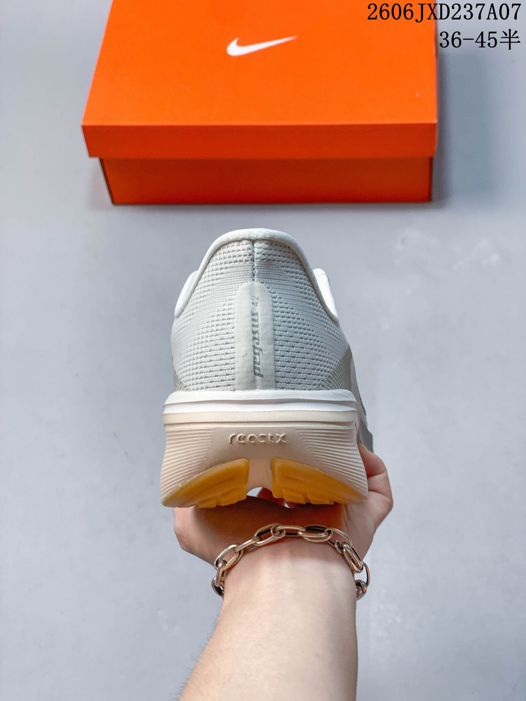 Rear view of a Nike Pegasus 42 shoe showing the heel and outsole.