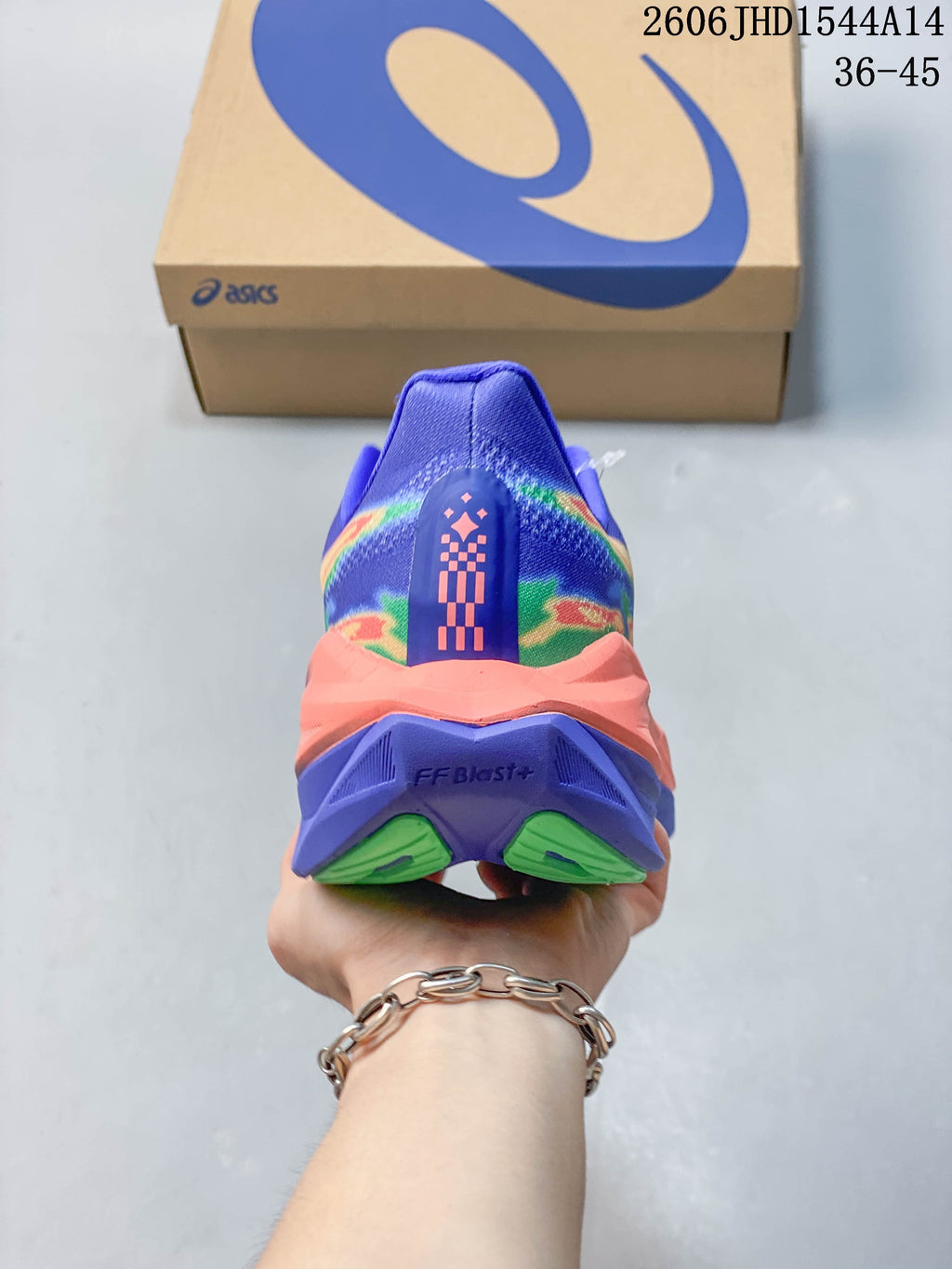 Rear view of the shoe showing the heel and layered midsole