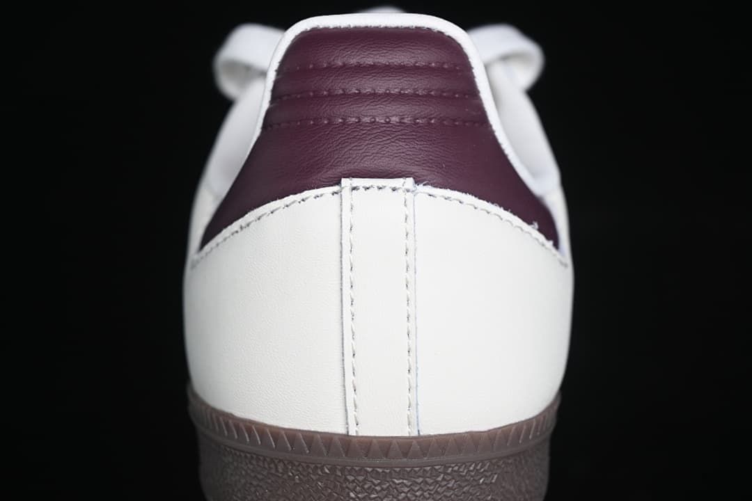 Rear view showing burgundy heel detail and dark outsole