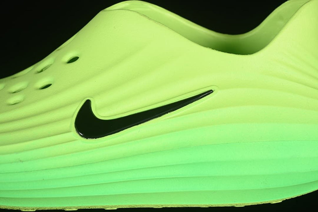 Close-up of the side Swoosh and layered sculpted profile.