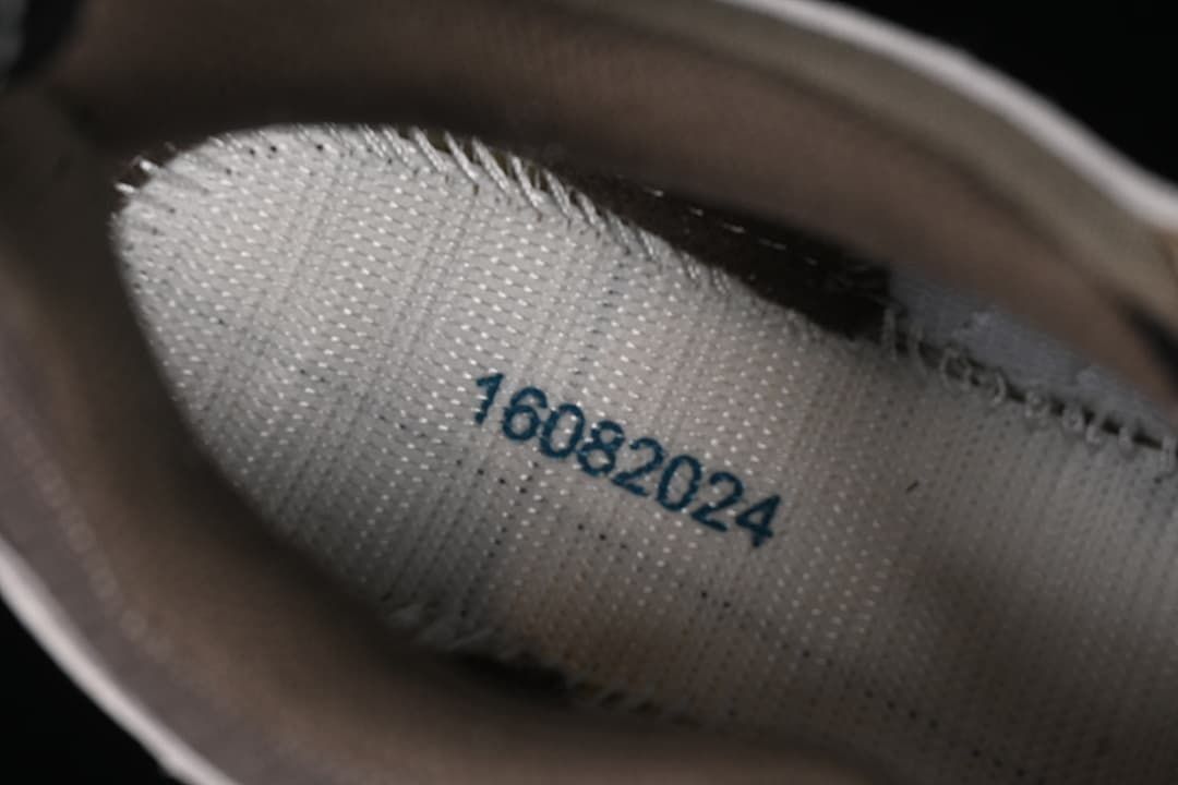 Close-up of interior shoe lining with printed marking