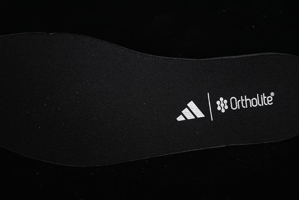 Insole marked with adidas and Ortholite branding
