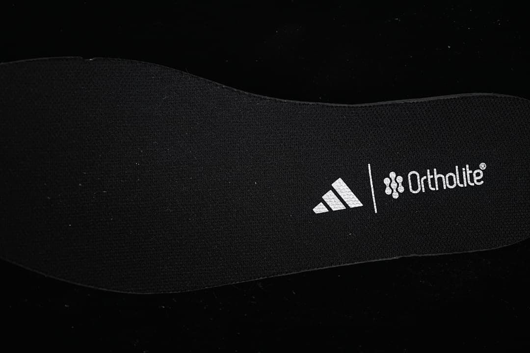 Insole marked with adidas and Ortholite branding