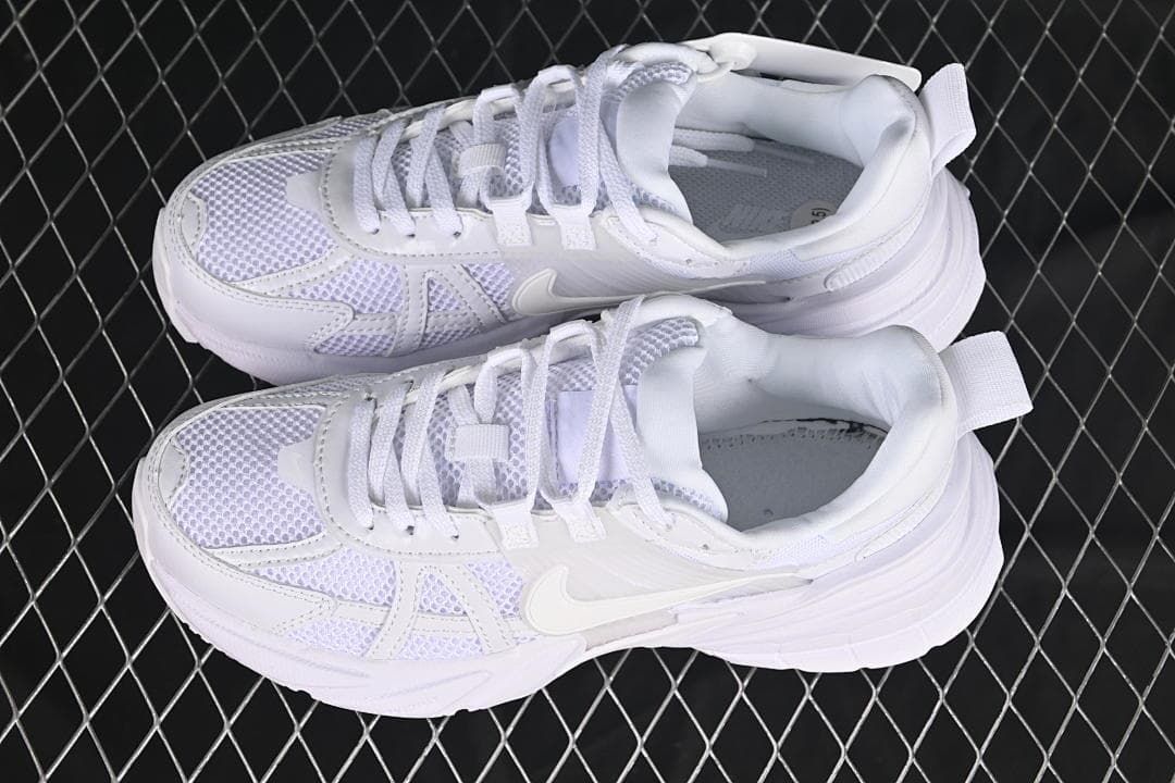 Pair of white Nike V2K Run sneakers shown from above.