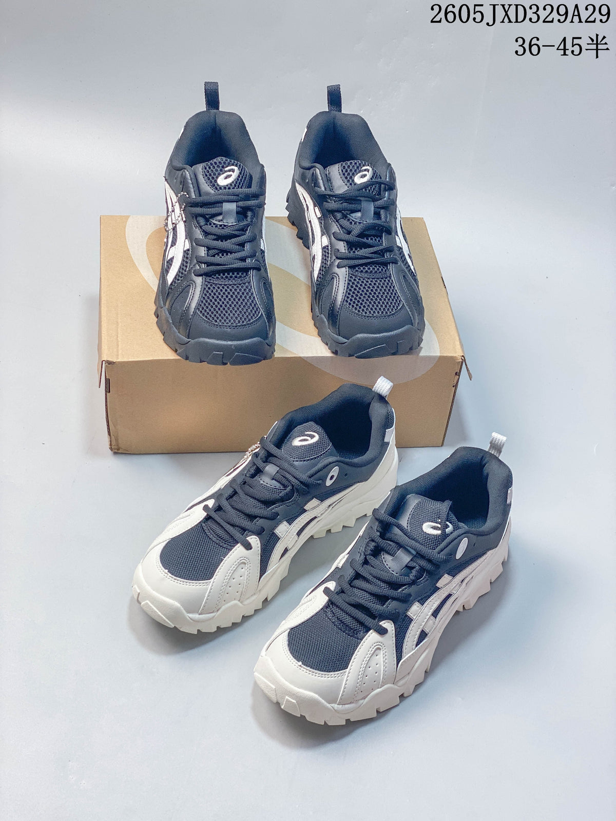 Navy and white Onitsuka Tiger sneakers shown from front and angled views.