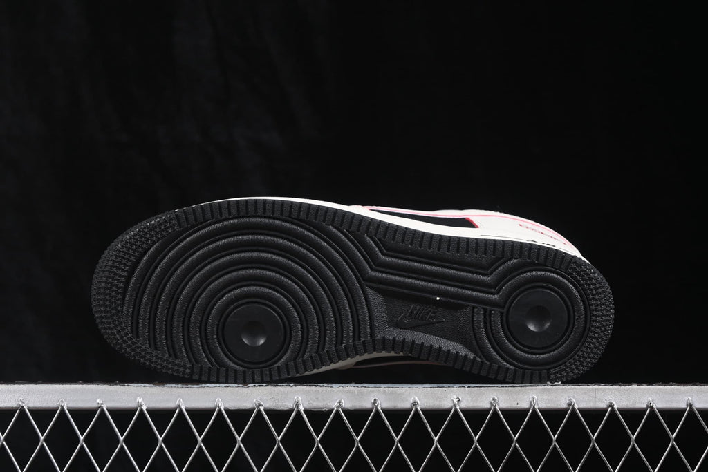 Outsole view showing the black circular traction pattern and molded tread.