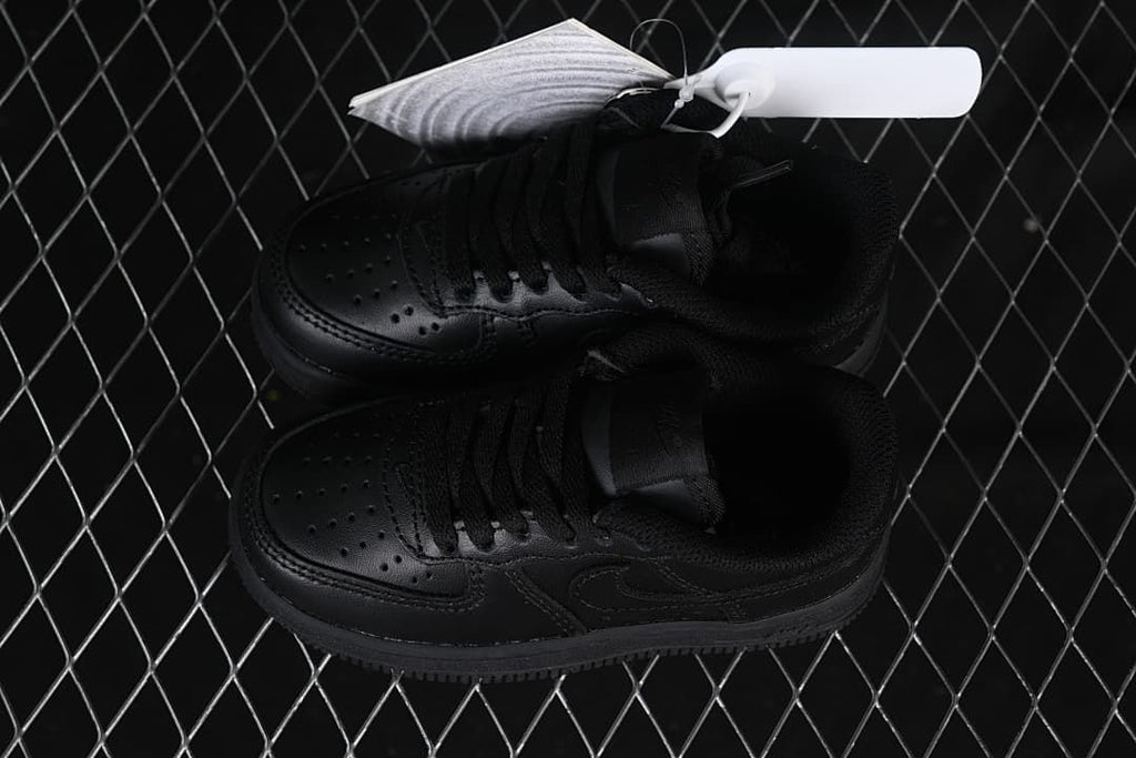 Pair of black low-top sneakers viewed from above