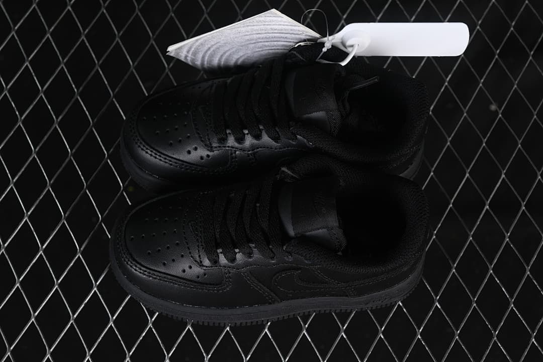 Pair of black low-top sneakers viewed from above