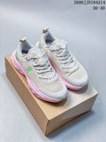Pair of gray On Cloudpulse Next sneakers with pink soles and green accents