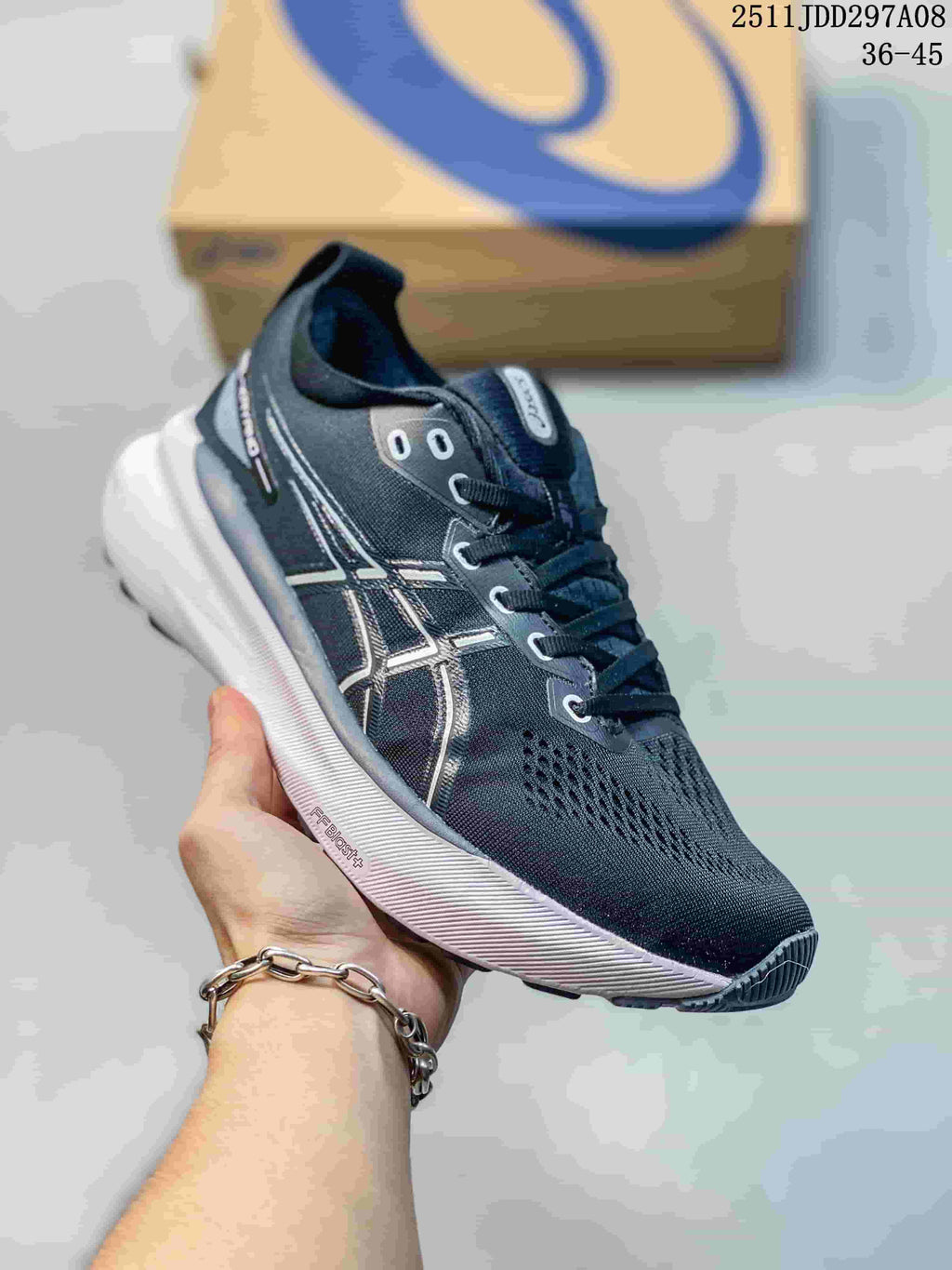 Dark gray ASICS running shoe with light accents and sculpted white midsole