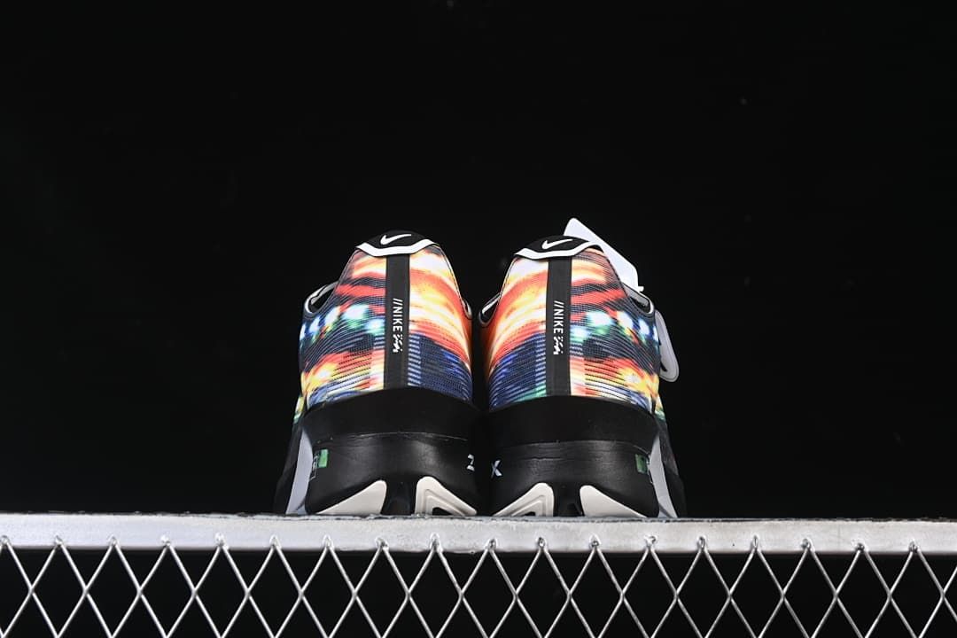 Rear view of both shoes showing the printed heel panels