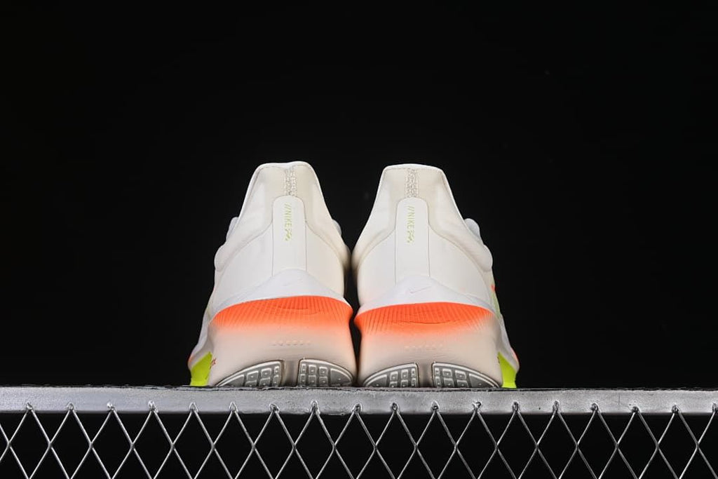 Rear view of both shoes showing the heel design and outsole tread.