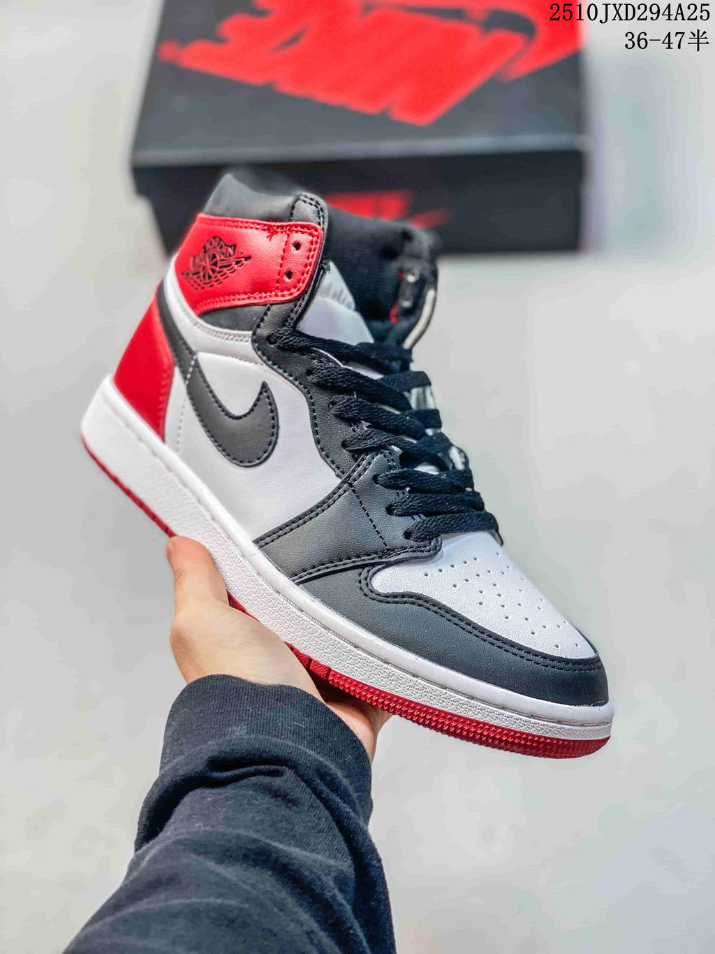 Red, gray, and white high-top sneaker with black laces