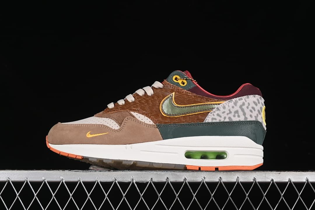 Side profile of the multicolor sneakers with brown, cream, green, and patterned panels.