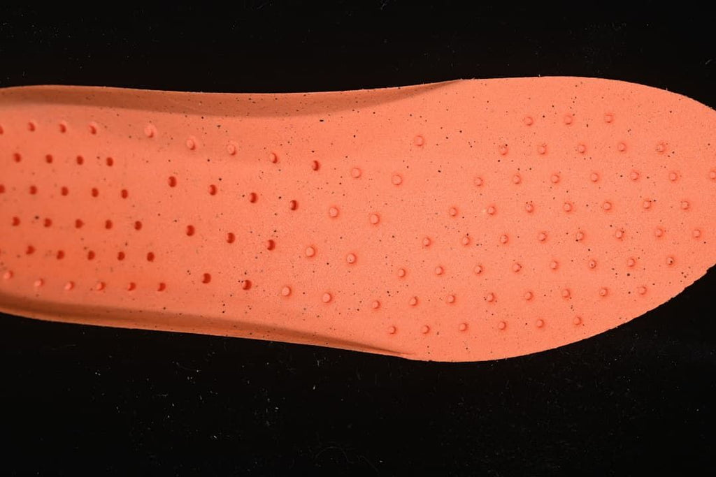 Close-up of the orange-colored insole surface