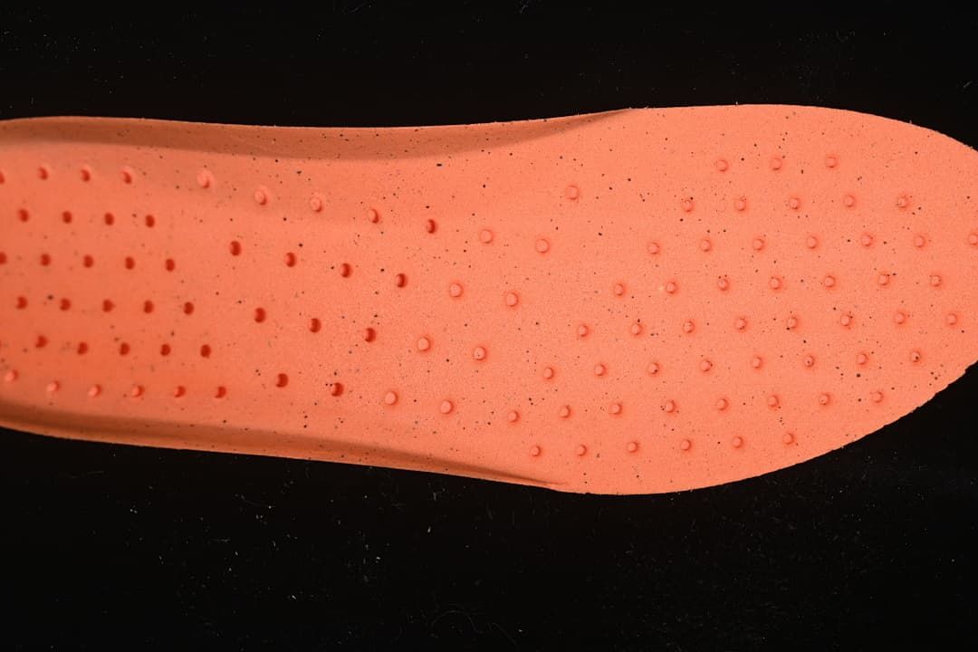 Close-up of the orange-colored insole surface