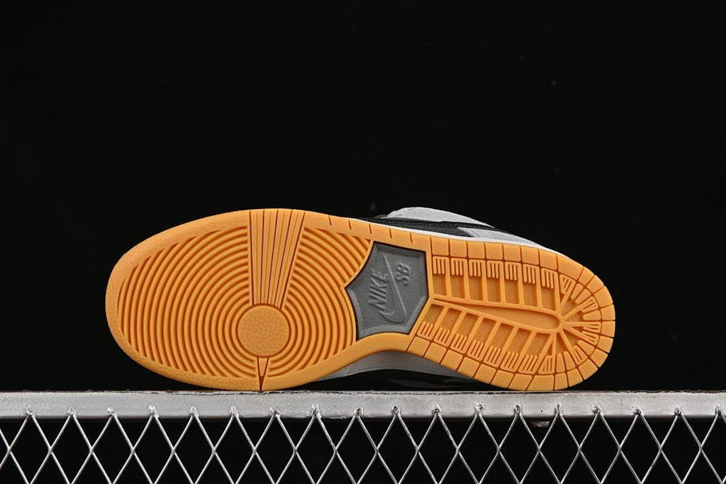Underside view of the gum-colored outsole with patterned tread