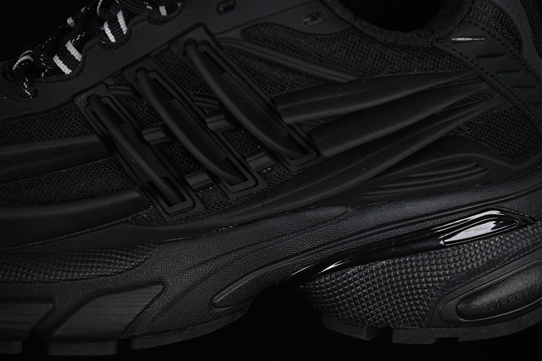 Close-up of the layered side overlays and chunky sole.