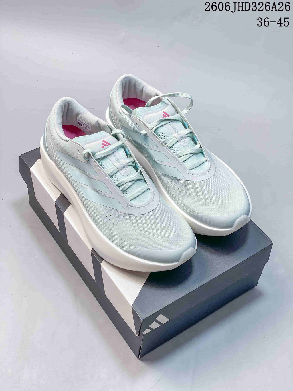Pair of pale mint adidas Supernova Rise 3 running shoes