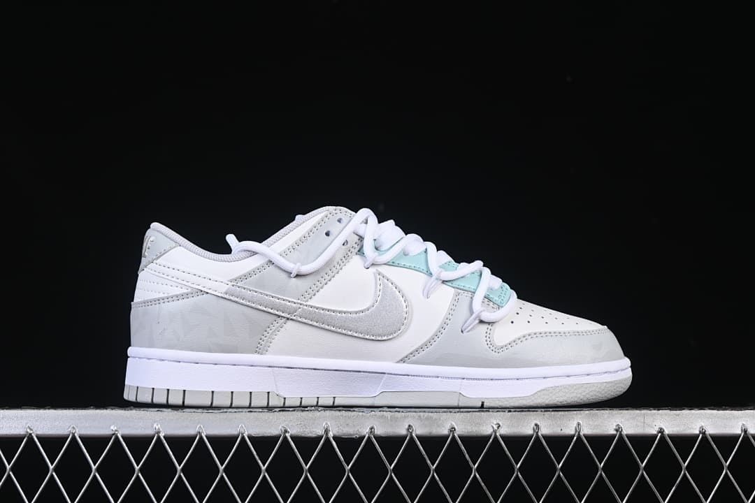 Side profile of a white and grey low-top sneaker