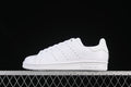Side view of a white adidas Stan Smith low-top sneaker
