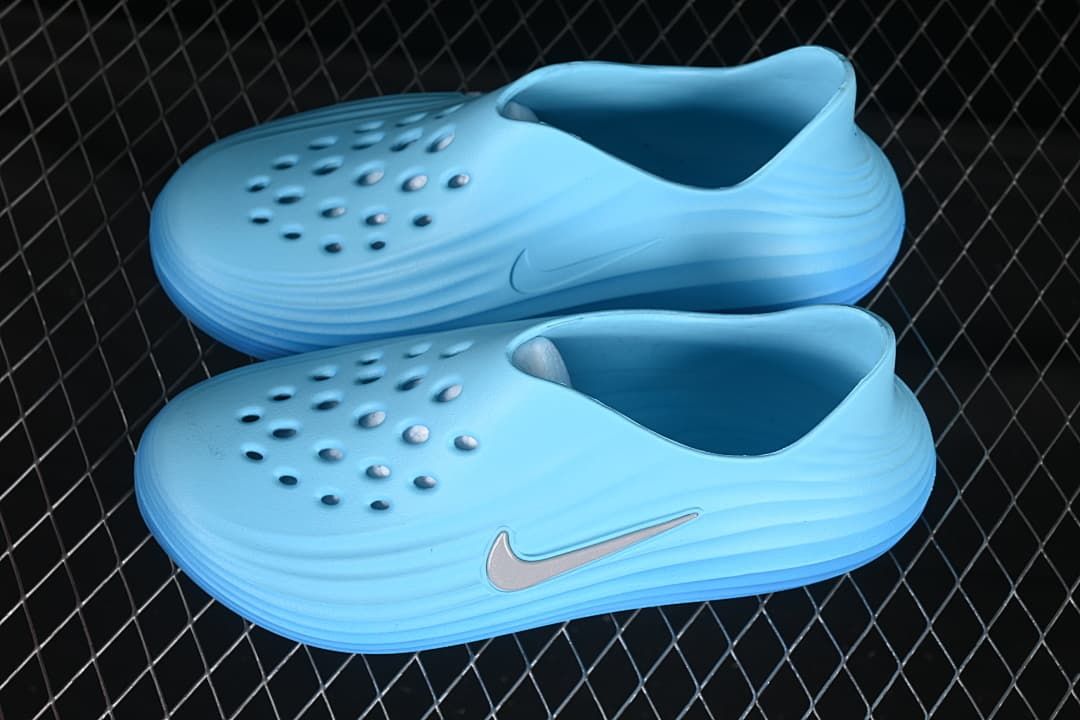 Pair of blue clogs shown from above and the side