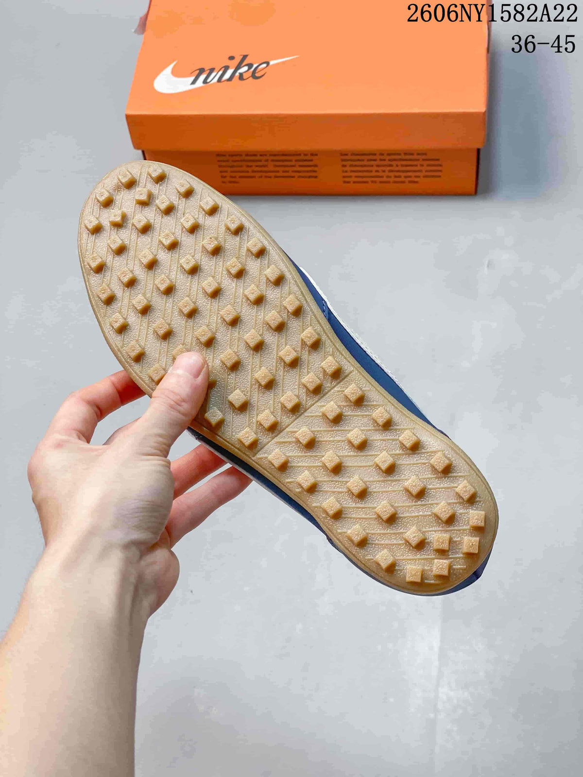 Close-up of the gum-colored outsole with raised tread