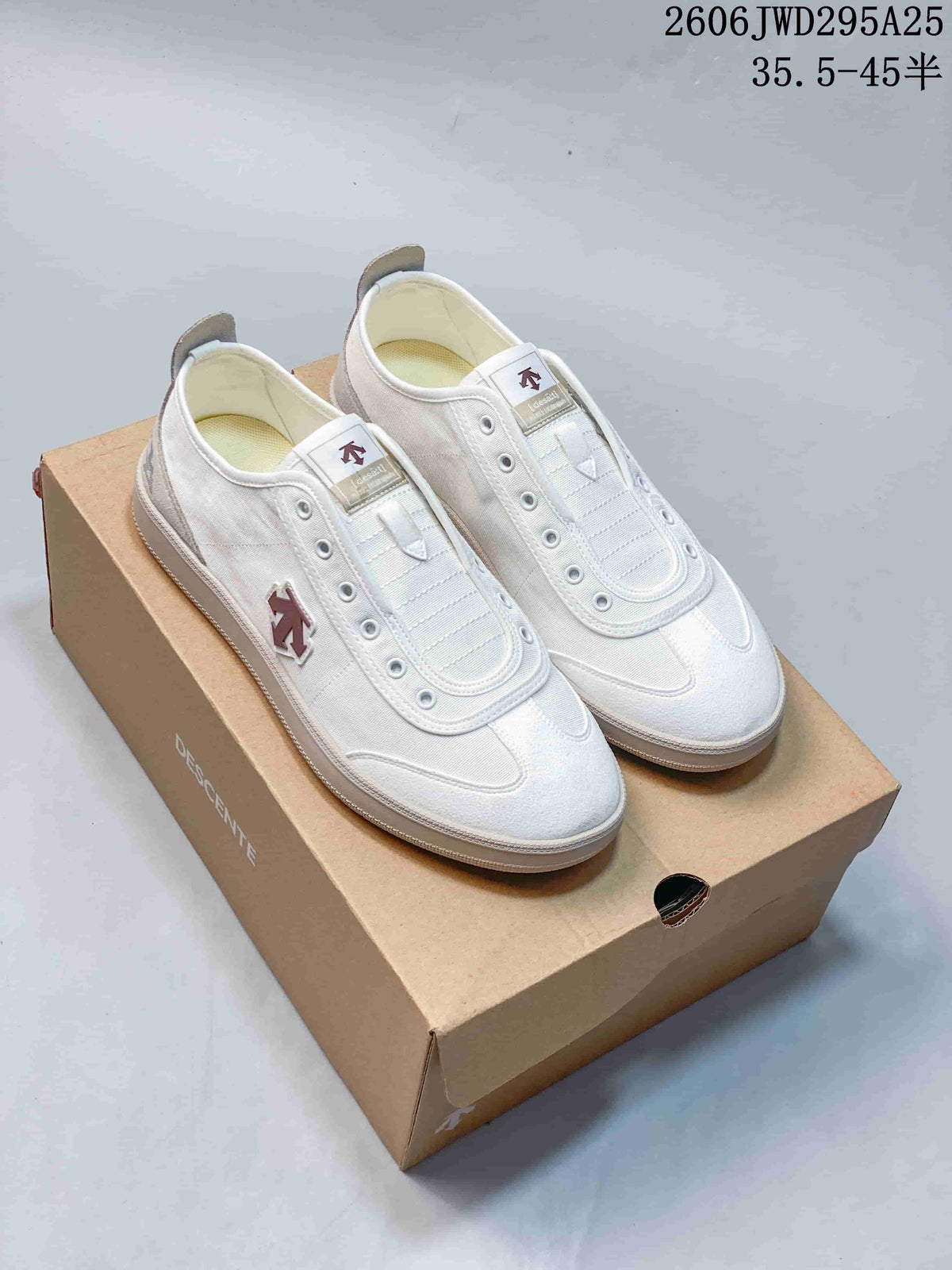 Pair of white DESCENTE CHRON sneakers with gray accents