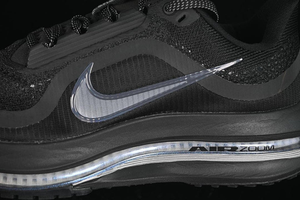 Close-up of the Swoosh, mesh upper, and Air Zoom-branded midsole.