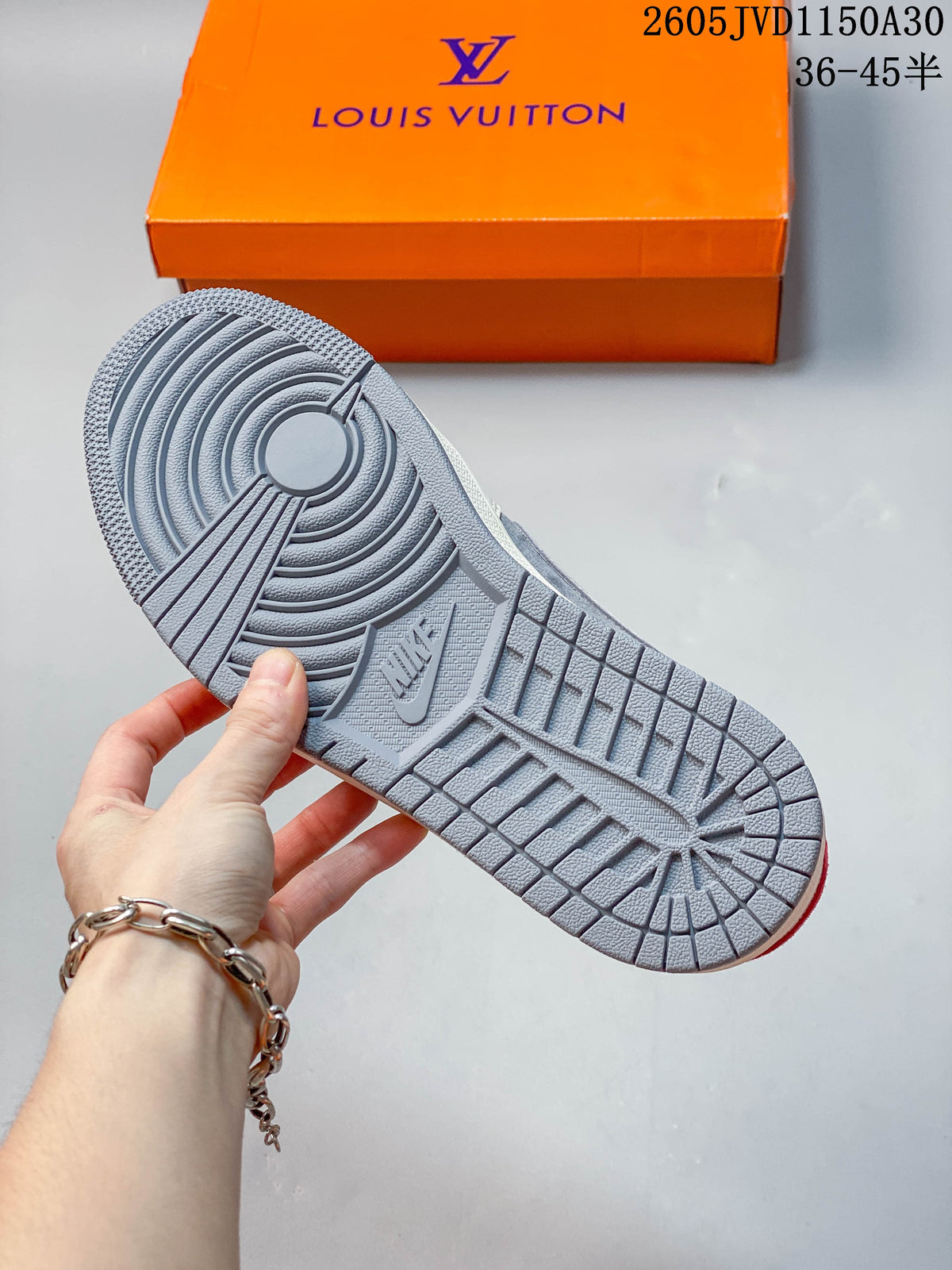 Close-up of the grey patterned outsole on a low-top sneaker