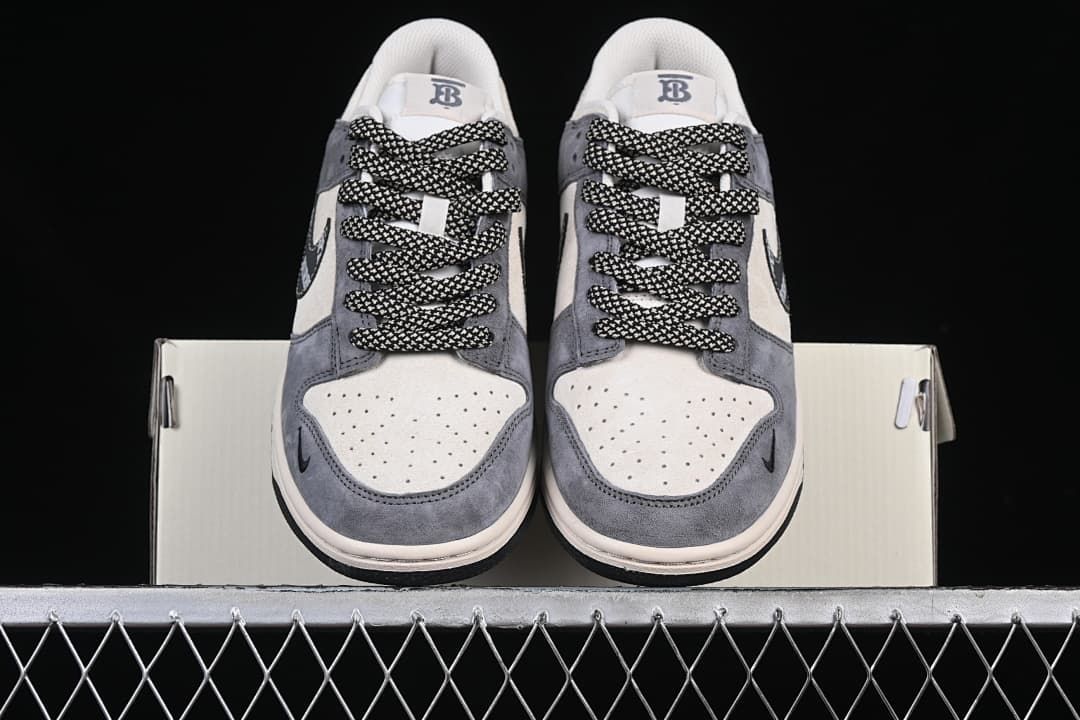 Front view of the pair showing perforated toes and patterned laces