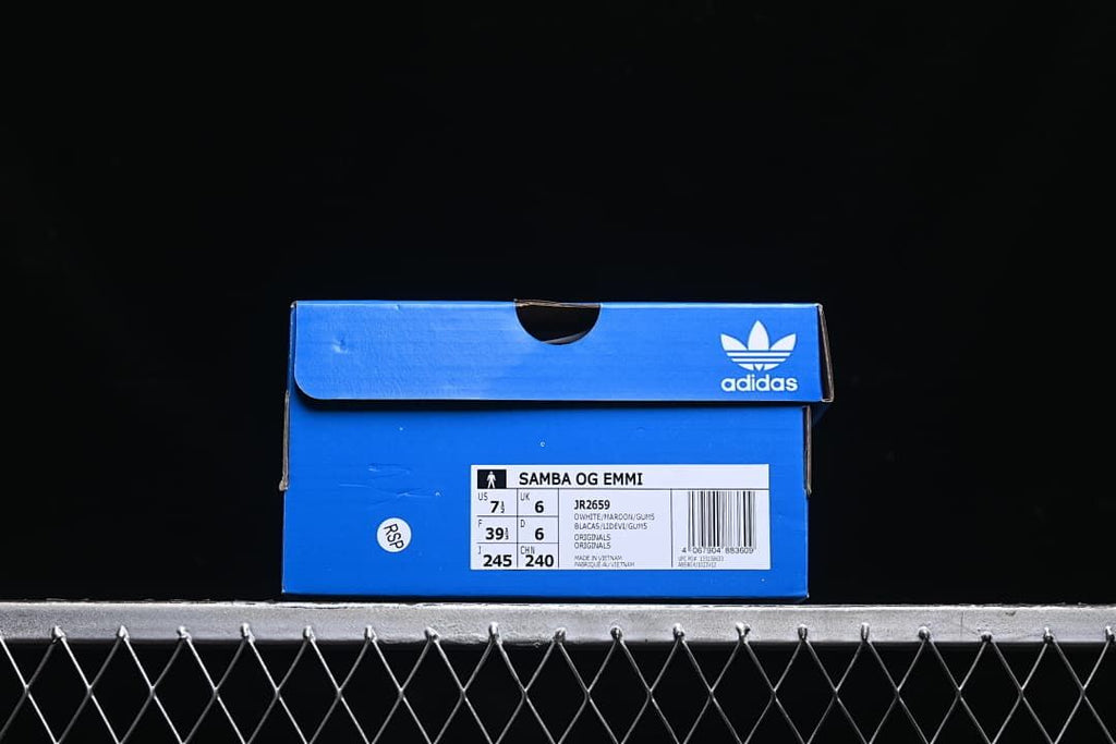 Blue shoe box label identifying Samba OG EMMI, JR2659, and the photographed sample size