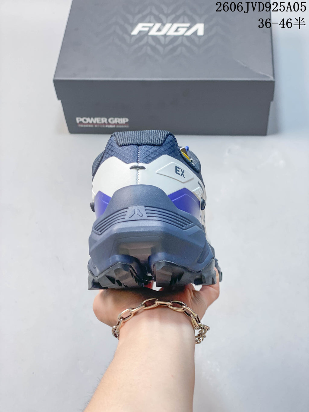 Rear view of the shoe showing the heel structure and outsole.