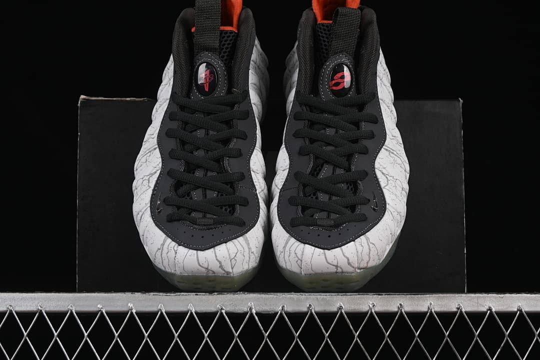 Front view of both sneakers showing the patterned toes and black lacing.