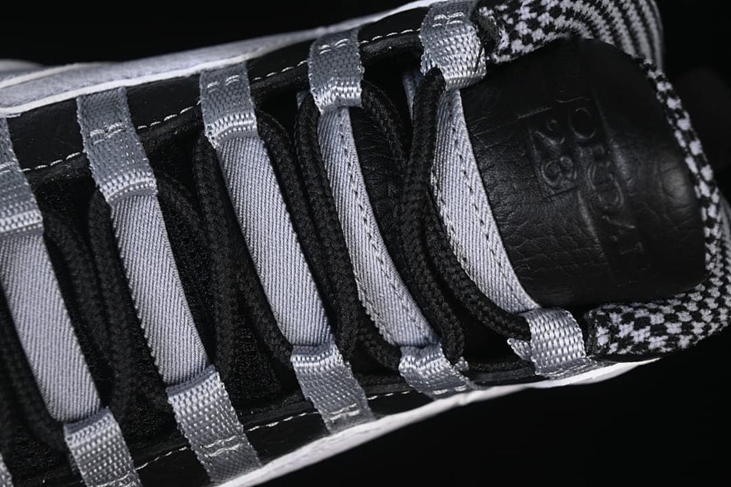 Close-up of the black laces and grey lace loops