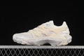 Side view of pale ivory Salomon XT Pu.re Advanced shoes with a light gray patterned midsole.