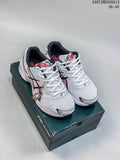 Pair of white ASICS GEL-1130 sneakers with black and red accents, displayed on a shoebox