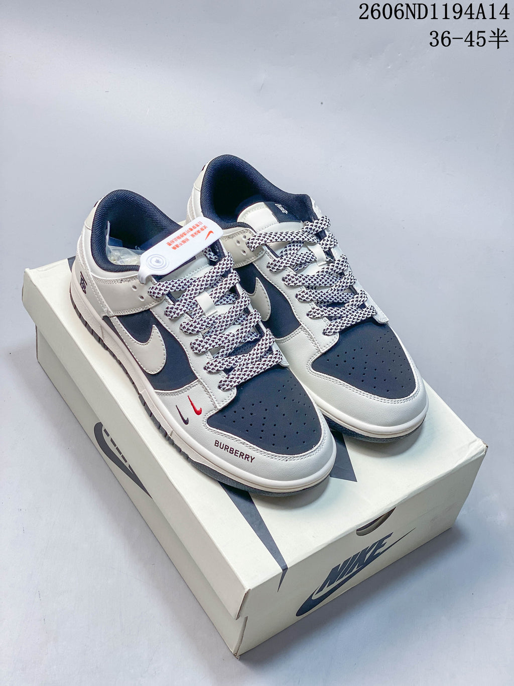 Three custom Nike Dunk Low-style sneakers shown from above, including white and navy-and-white designs.