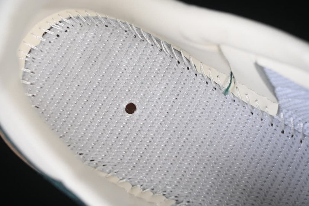 Close-up of the shoe's interior lining and insole