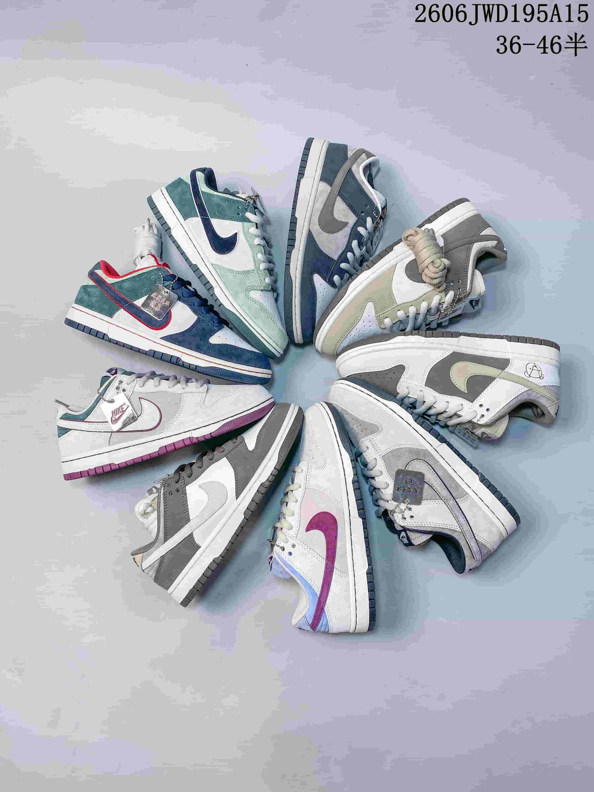 Nike SB Zoom Dunk Low sneaker in pale gray and pink with a purple accent and dark outsole.