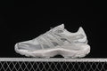 Side view of a light grey Salomon XT Pu.re Advanced shoe against a black background
