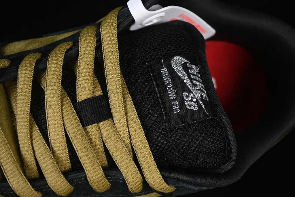 Close-up of the tongue branding and contrasting brown-gold laces